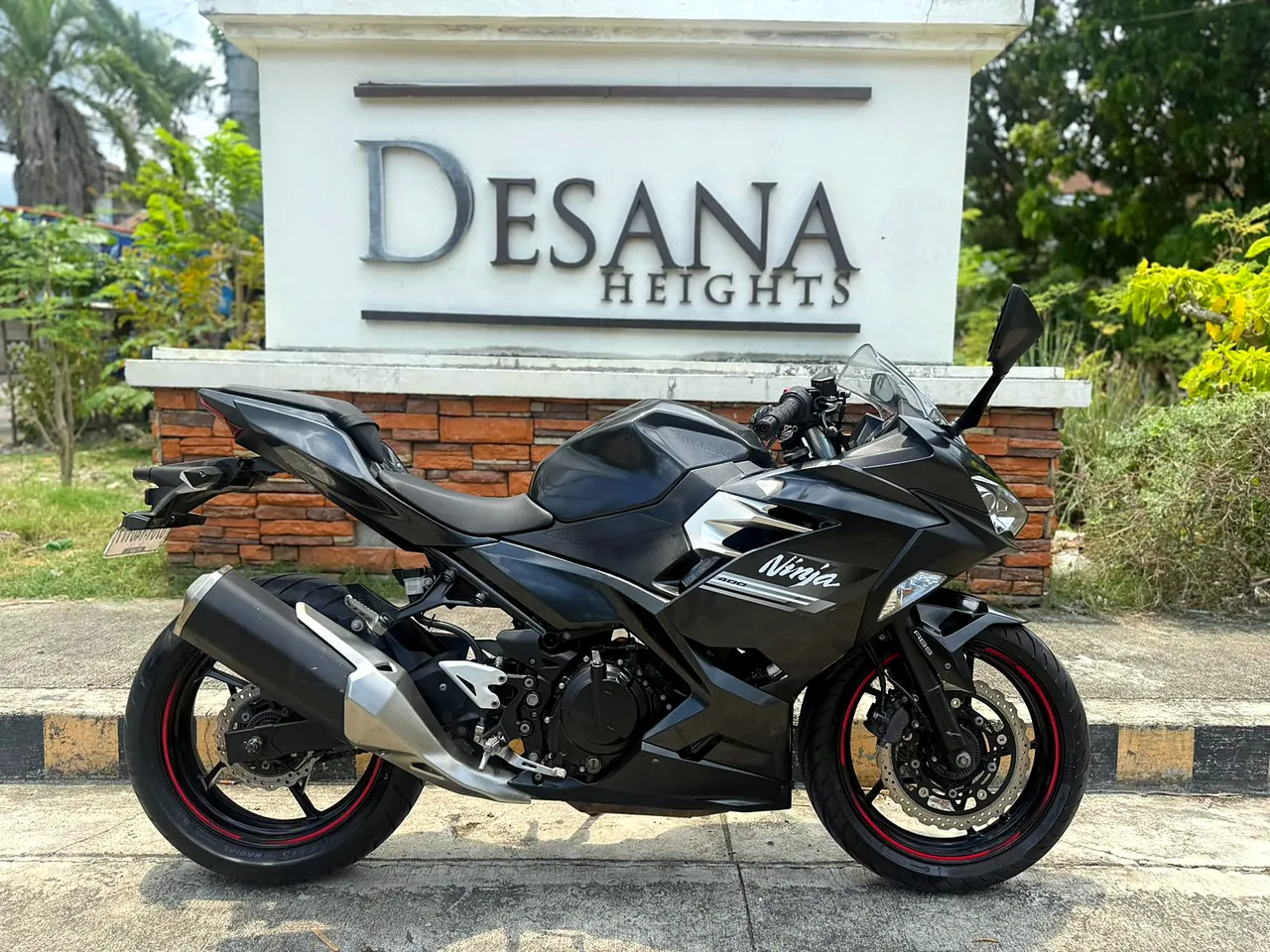 Our Kawasaki Ninja 400 for rent in Cebu, parked at Desana Heights